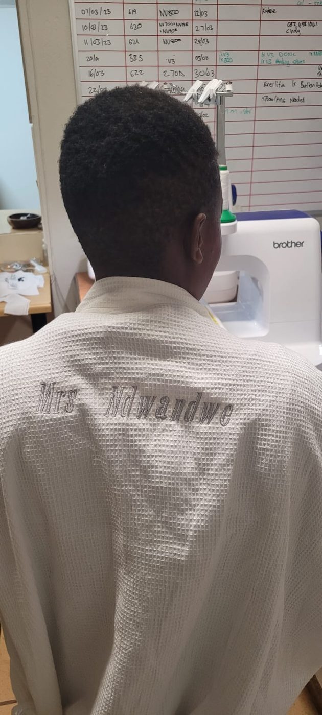 Personalised name embroidered on a robe by JJ Embroidery Services