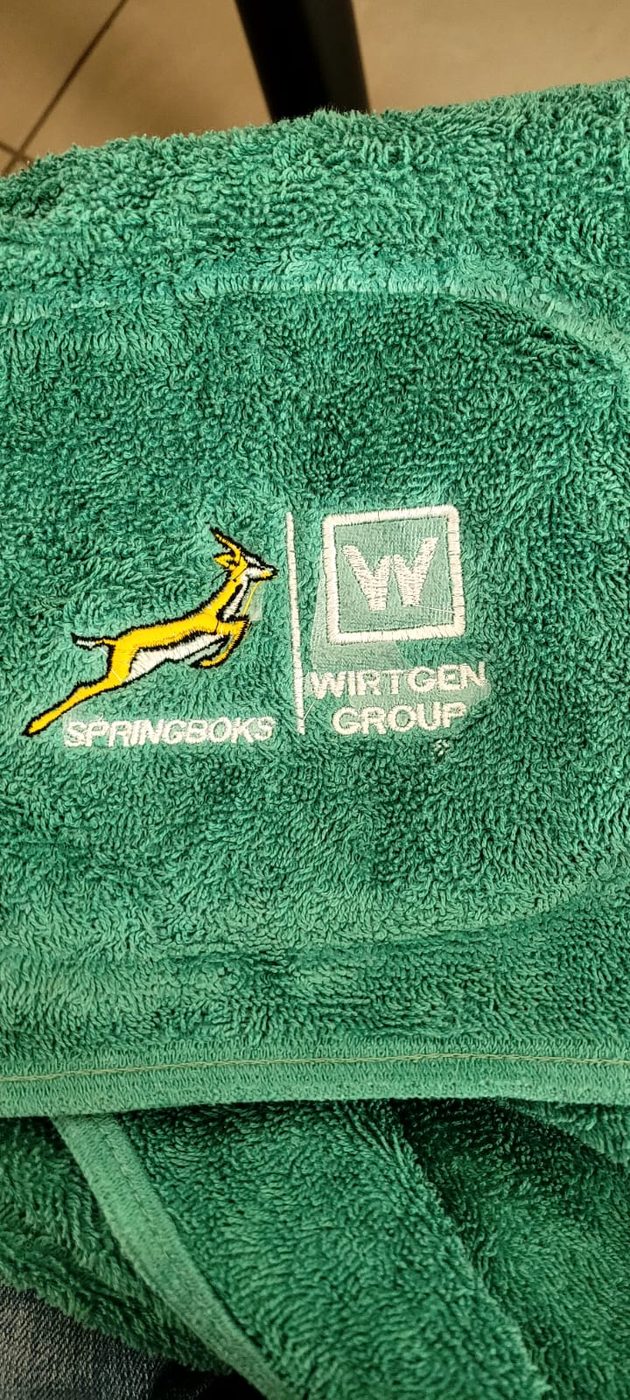 Springboks and Wirtgen Group branded towel embroidered by JJ Embroidery Services